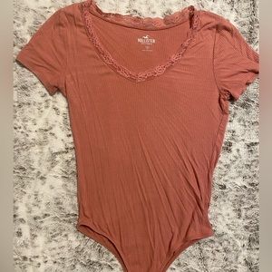 Salmon pink bodysuit